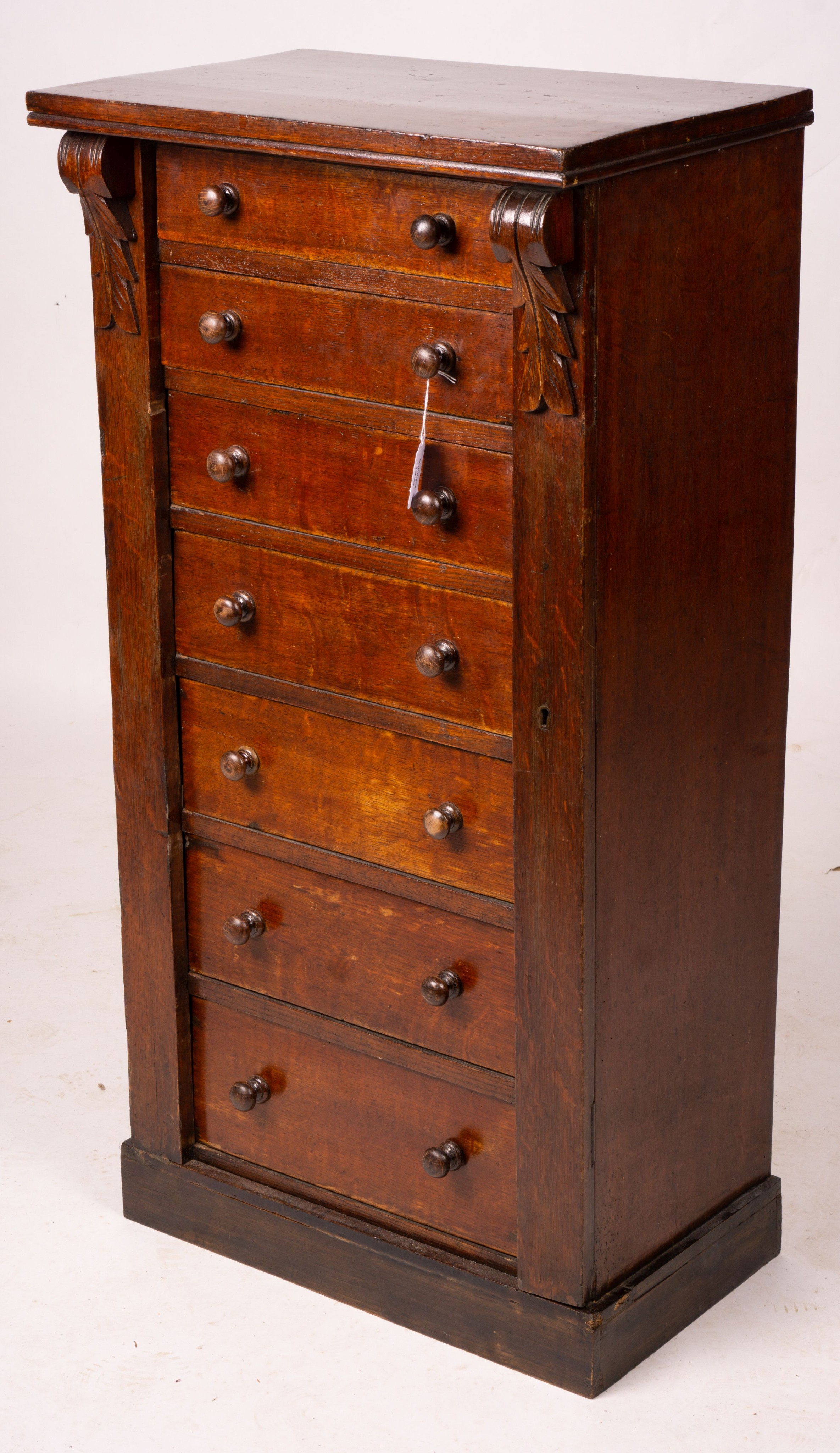 A late Victorian oak Wellington chest, width 51cm, depth 34cm, height 100cm